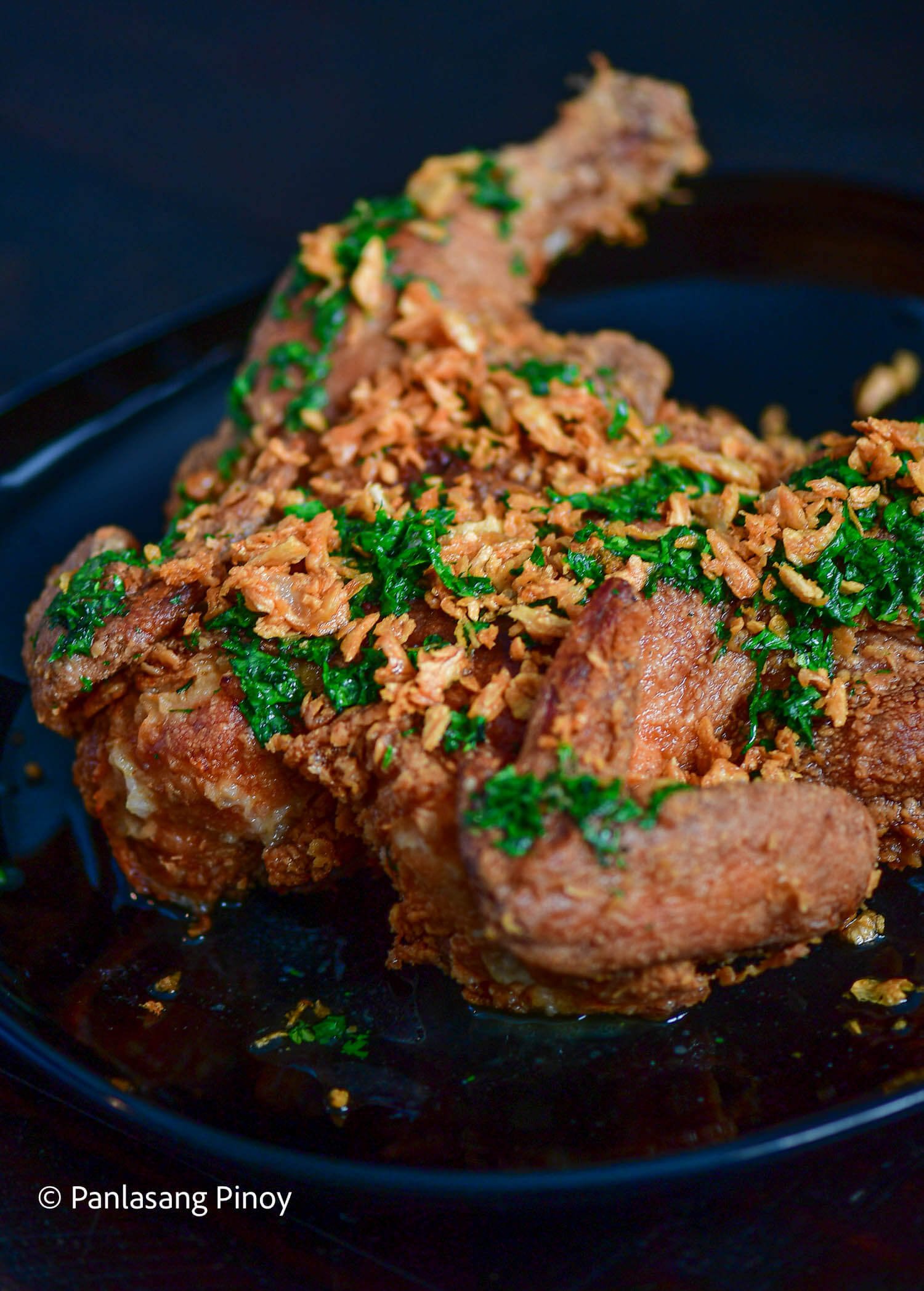 fried whole chicken with garlic and butter