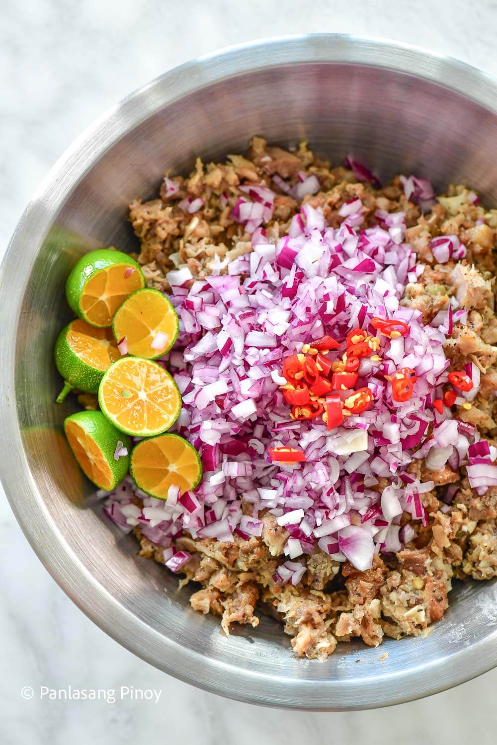 Mixing Sisig in a Bowl