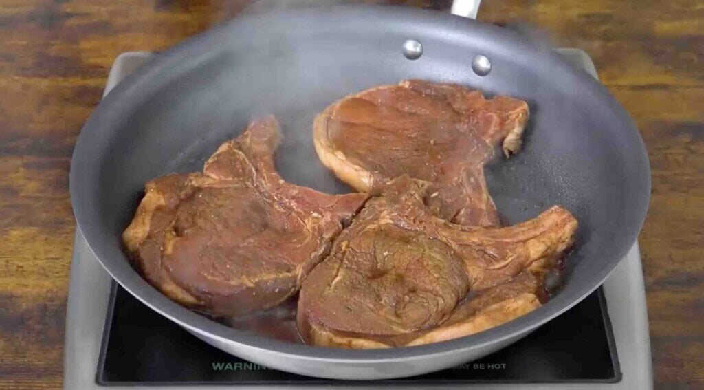 step 2 fry the pork chops